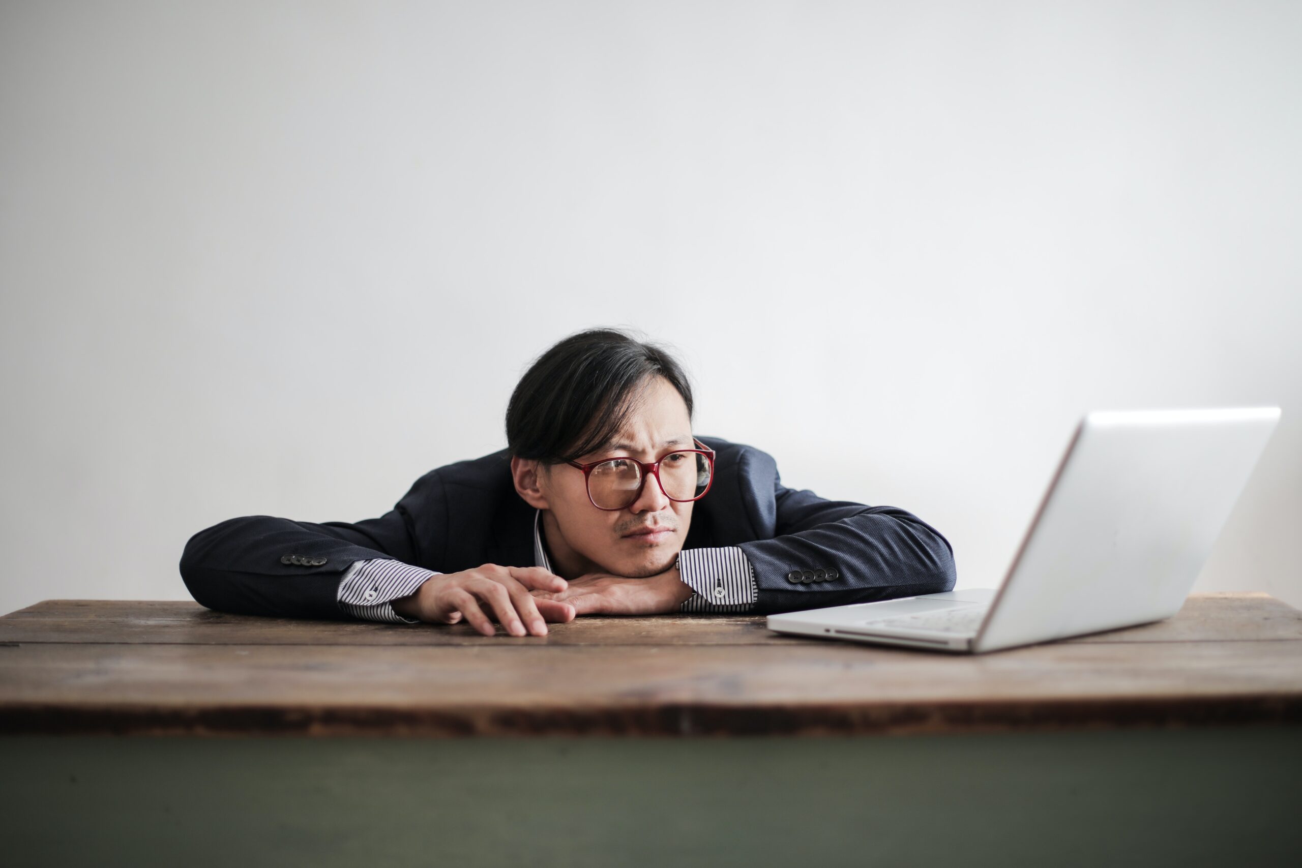man bored by computer